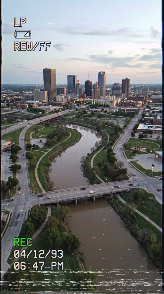 Side-by-side transition comparison of the Fort Worth downtown skyline morphing from a grainy 1990s VHS aerial view into a vibrant modern 4K high-rise city center