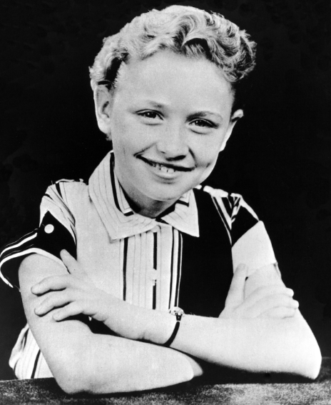 Young Dolly Parton as a child songwriter illustrating inspiring Dolly Parton facts